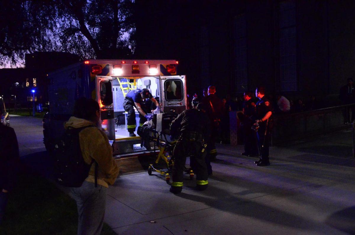 Student performs CPR on collapsed guest lecturer
