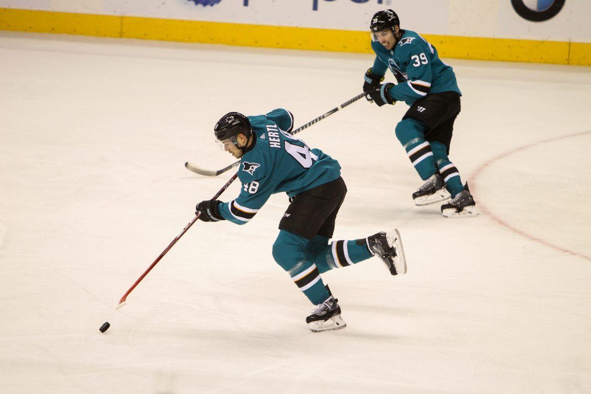 Sharks shot down by Ducks in season opener