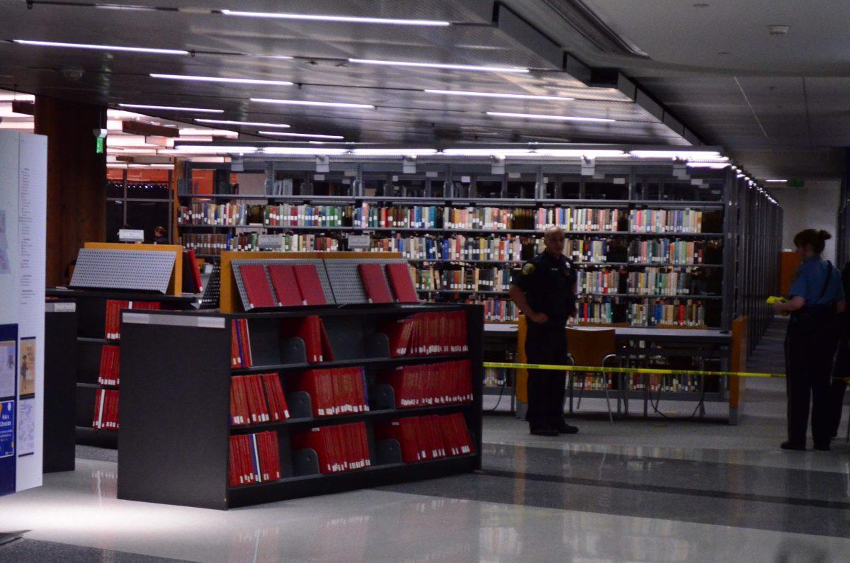Police put up caution tape on the seventh floor of the library. Mauricio La Plante/Spartan Daily