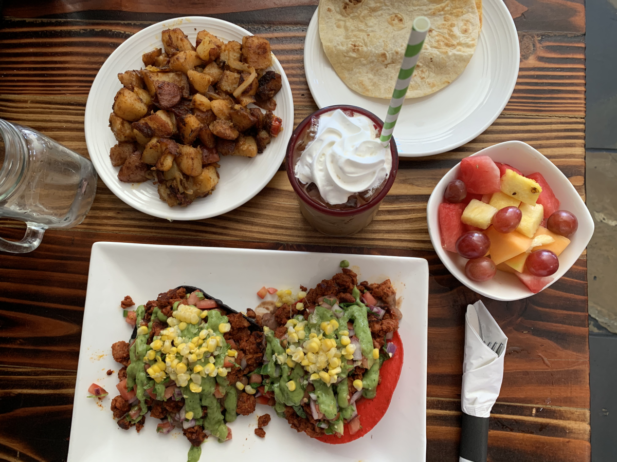 Tostadas serves hearty spreads, including vegan tostadas with sides including breakfast potatoes, fruit and tortillas. 