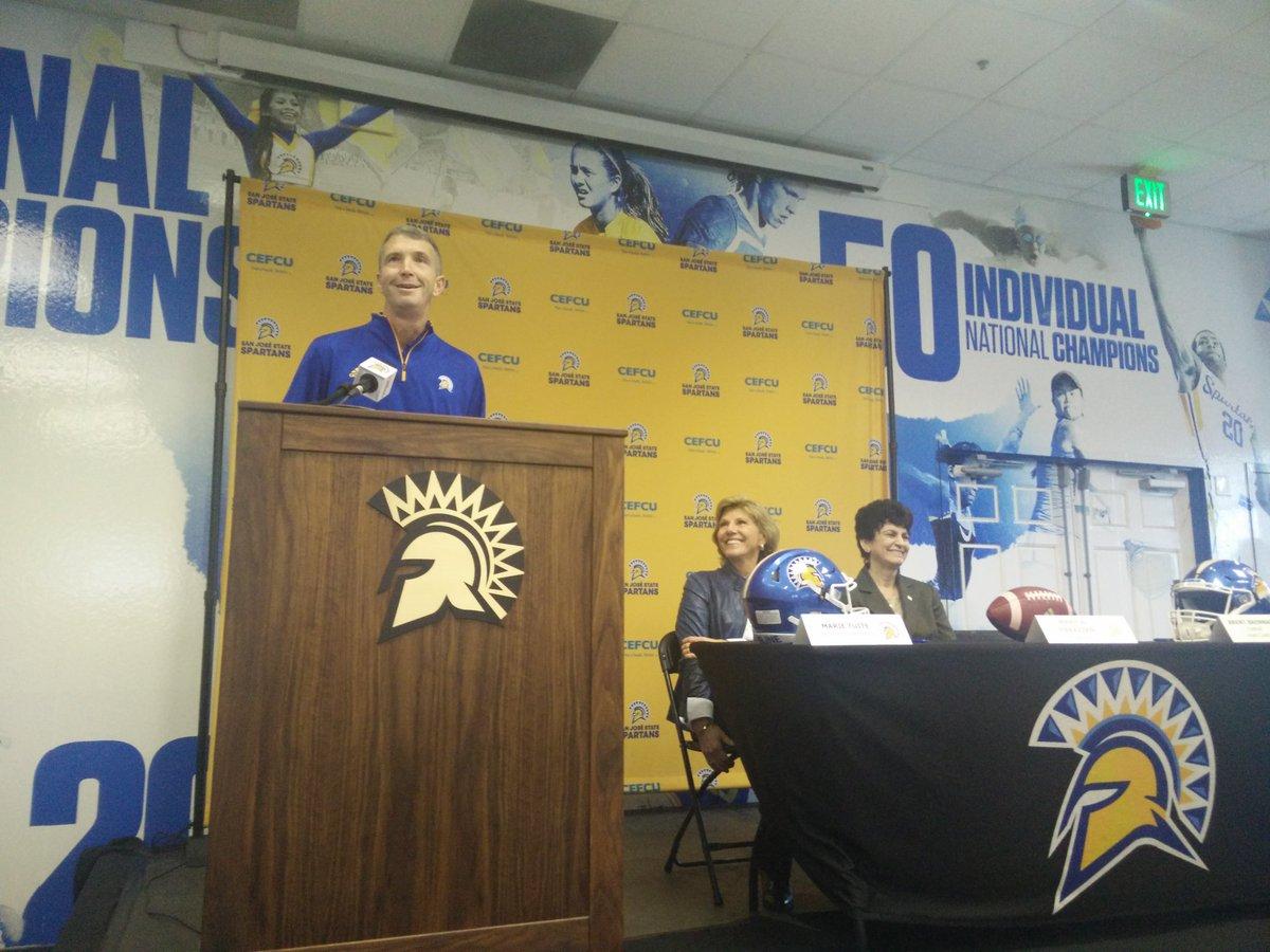 Football head coach Brent Brennan speaks during Friday's press conference announcing his contract extension as Athletics Director Marie Tuite (center) and SJSU President Mary Papazian (right) look on. Kunal Mehta/Spartan Daily