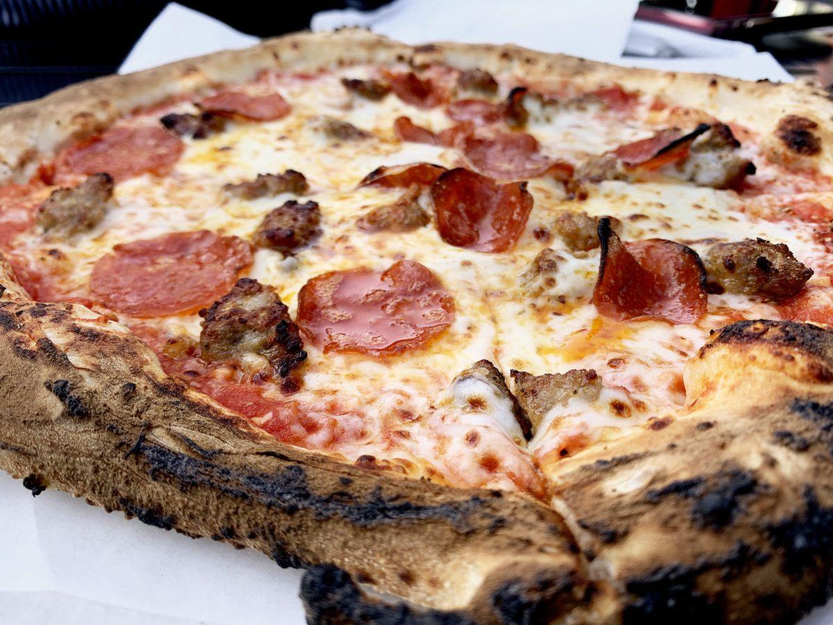 The Superiore at Pizza Bocca Lupo in San Pedro Square is topped with pepperoni, sausage and roasted garlic. Photo by Chris Core