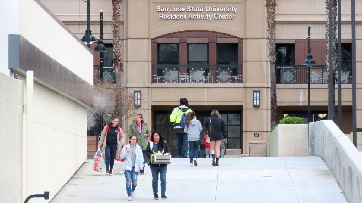 Students load up on food and supplies as they prepare to &#8220;shelter in place&#8221; because of the coronavirus Monday. Christian Trujano/Spartan Daily