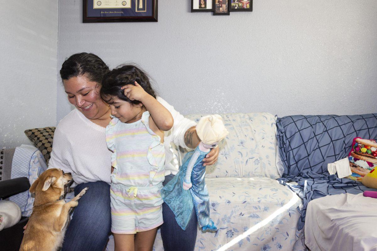 Fatima Lopez Sandoval and her daughter, Bella, play at home in Palo Alto. Bella attended daycare at the Associated Students Child Development Center while her mom was in school. Briana Conte/Spartan Daily