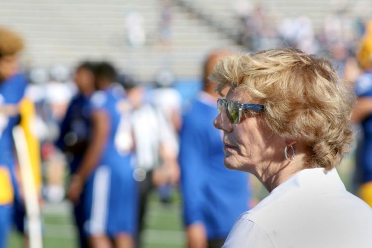   Athletics Director Marie Tuite gazes at the SJSU football team ahead of its game against the Utah State Aggies on Sept. 23, 2017 at CEFCU Stadium. Tuite has worked in the position for nearly two years. Ernie Gonzalez | The Spear Archives (2017)