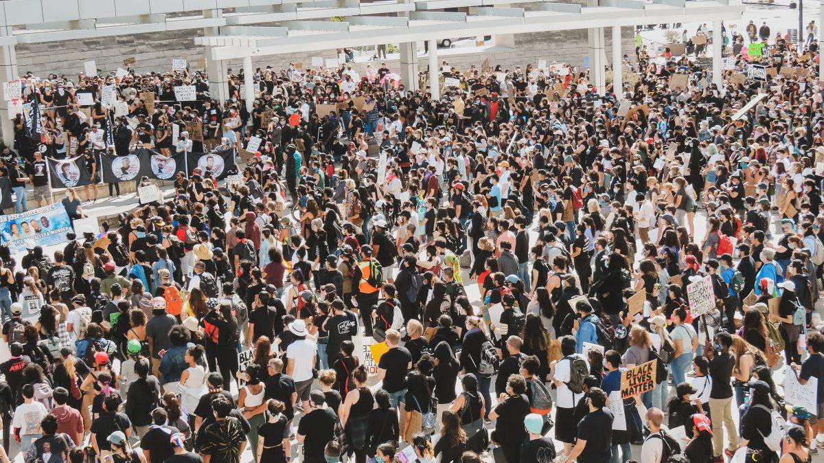 A sea of hundreds of protesters gather outside of City Hall Friday and listen to various  speeches about police brutality during the Die In event hosted by the National Association for the Advancement of Colored People (NAACP). Christian Trujano/Spartan D