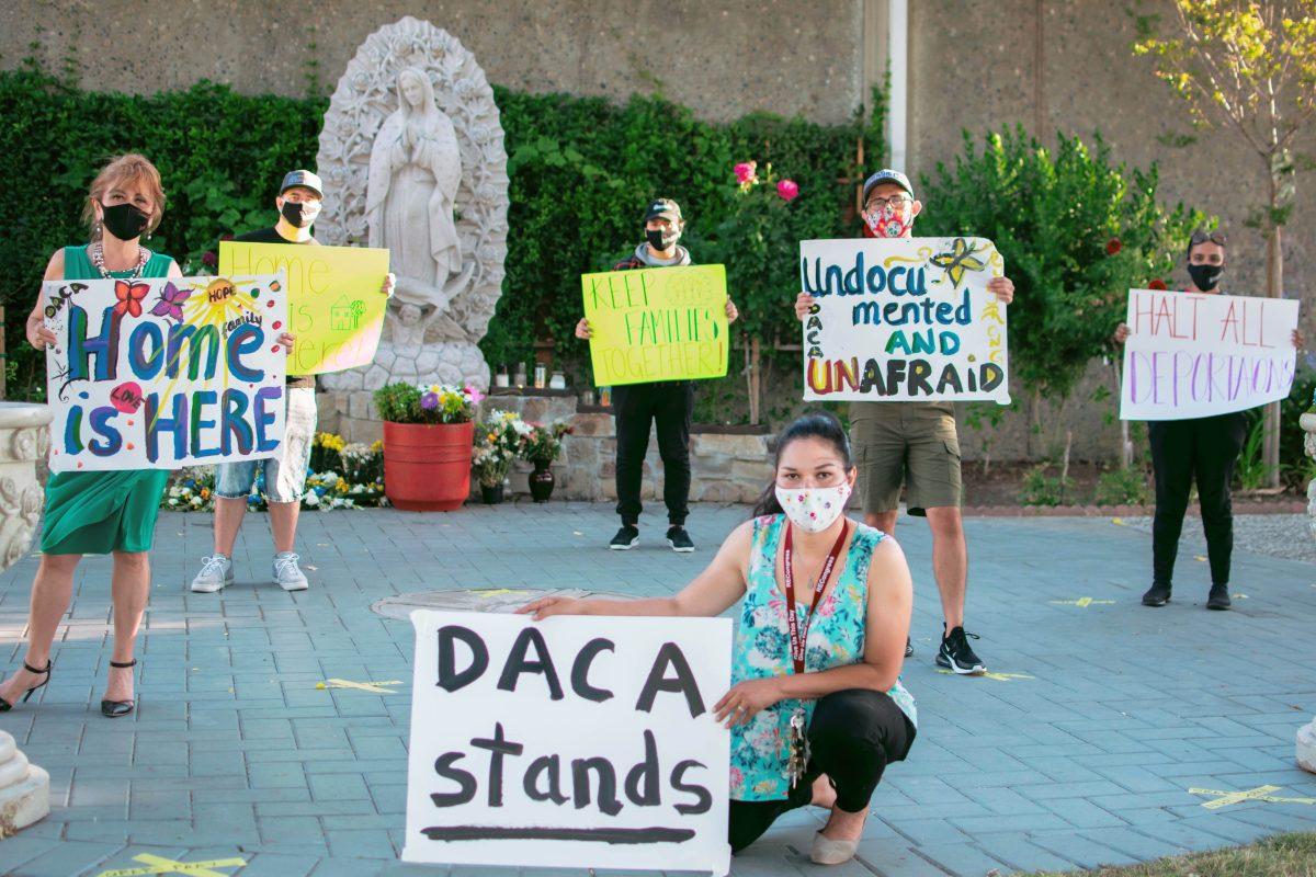 Members of Services Immigrant Rights and Education Network (SIREN) gathered in front of Our Lady of Guadalupe Church in San Jose Thursday to support the recent ruling on Deferred Action for Childhood Arrivals (DACA). Sanjuanita Garza/Spartan Daily 