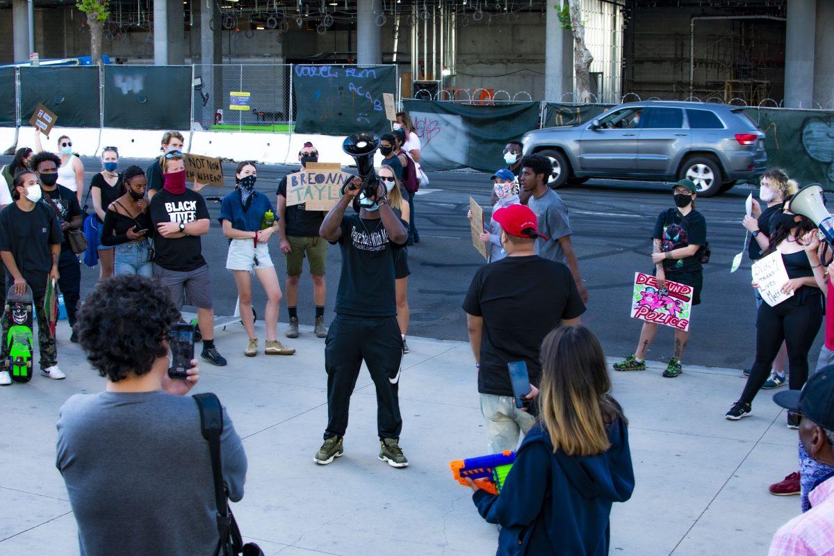 Protesters migrated to the sidewalks of City Hall shortly after the Brave Space SBBC march and discussion ended Friday. Sanjuanita Garza/ Spartan Daily 