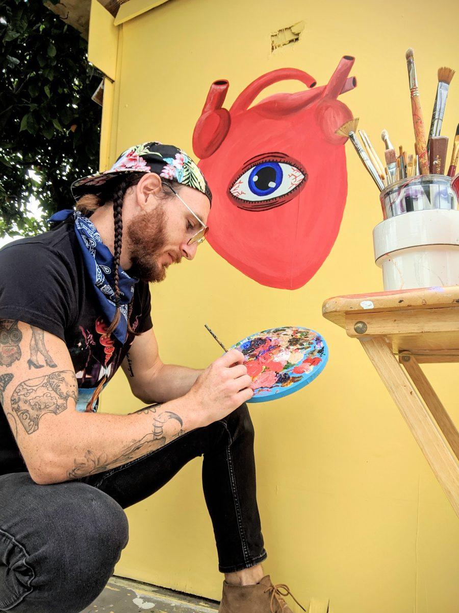 SJSU alumnus Matty Heimgartner paints &#8220;The Conscious Heart&#8221; on his backyard shed during the pandemic.