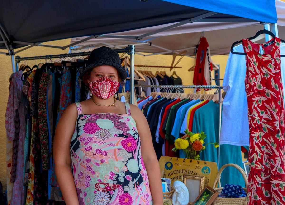 Saccid Tovar stands at her vintage shop El Jardin Vintage at a pop-up market in East San Jose on Saturday.