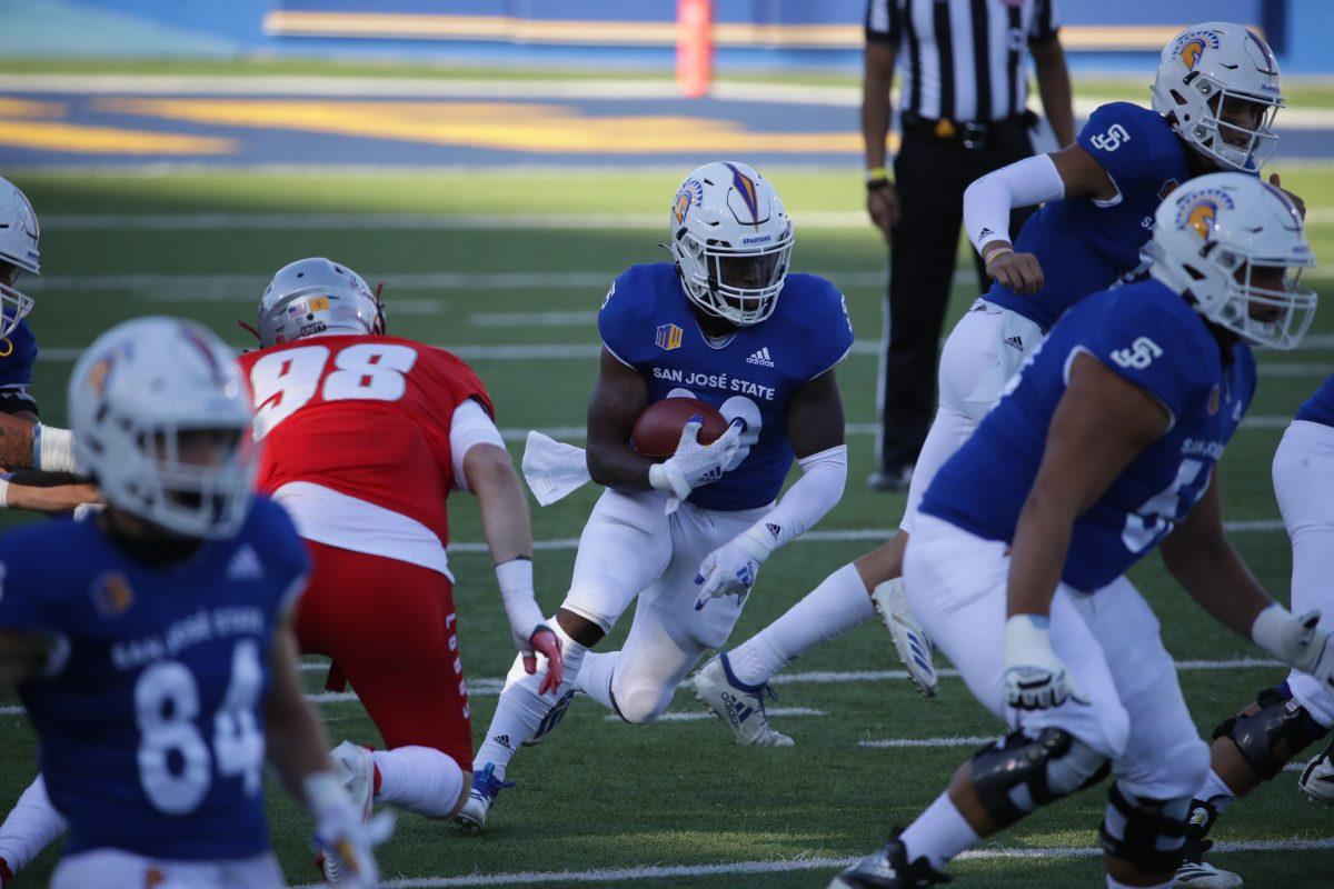 SJSU running back Shamar Garrett cuts through New Mexico&#8217;s defense during Saturday&#8217;s game at CEFCU Stadium on South Campus. Photo courtesy of SJSU Athletics.