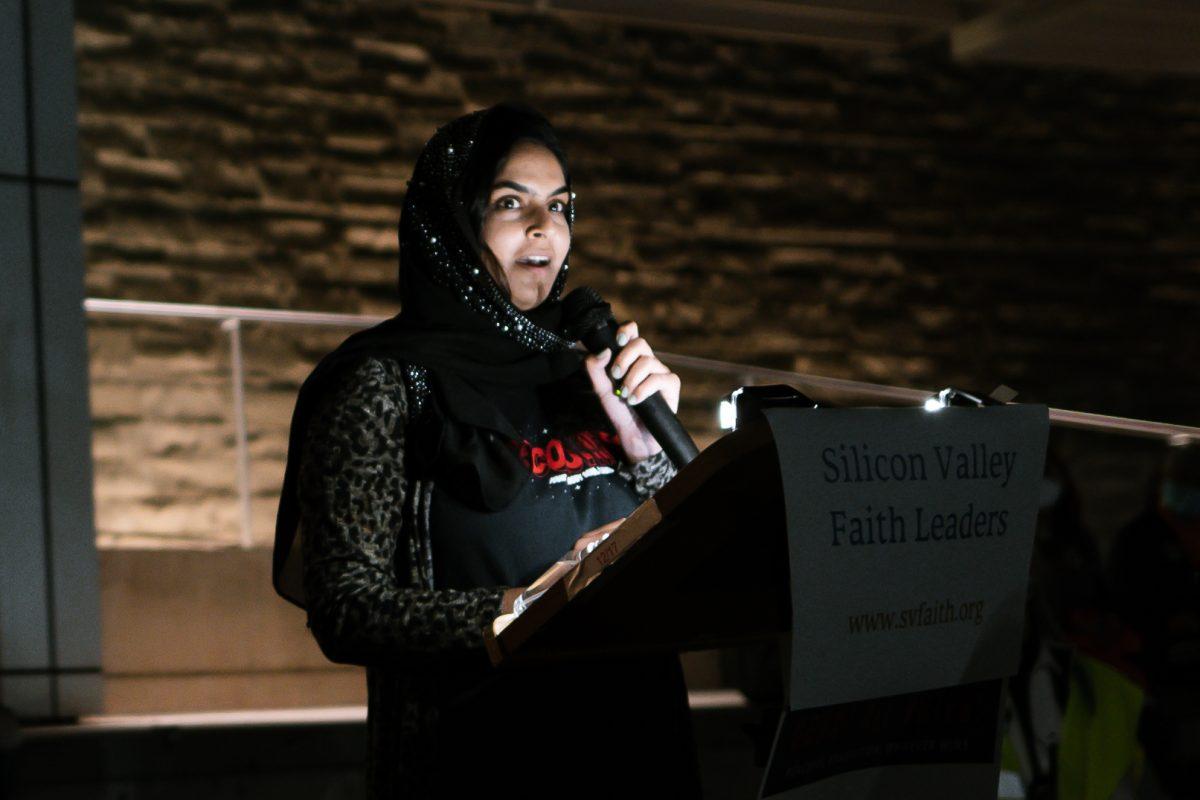Aliza Kazumi, advocacy manager for the Council on Islamic Relations, Bay Area chapter, speaks during the vigil Wednesday night outside San Jose City Hall. Blue Nguyen/ Spartan Daily.