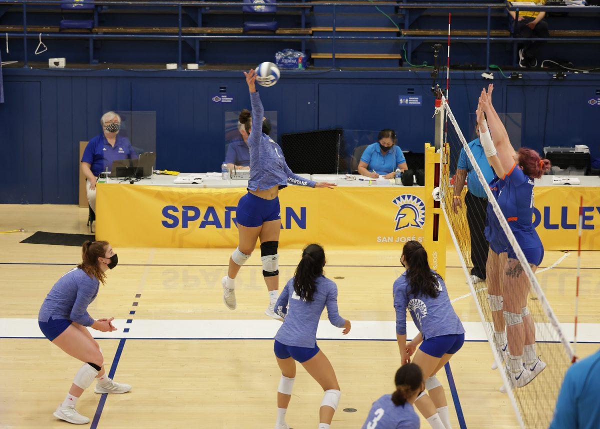SJSU outside hitter Latahevai Lousi spikes the ball during a match against Boise State on Feb. 5. Lousi has a total of 57 kills so far this season.