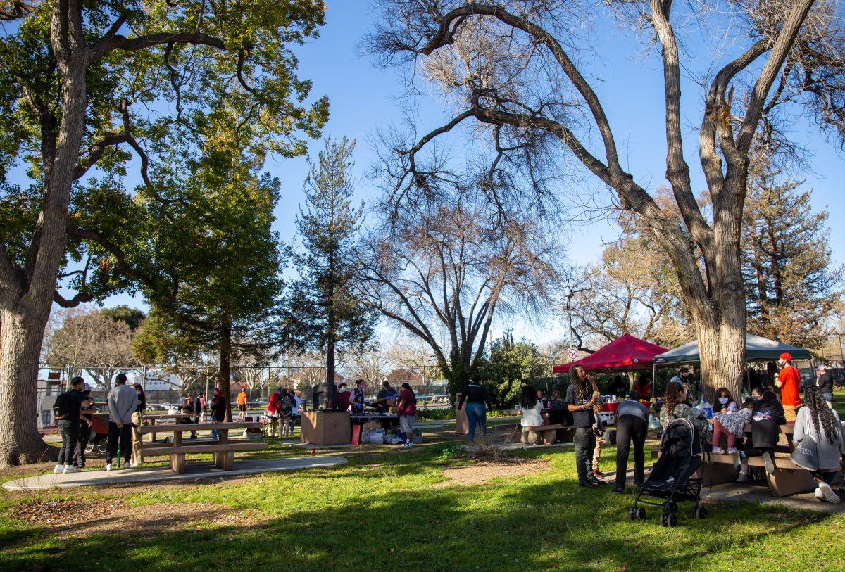 Community members celebrate the birthday of the late Gregory Johnson Jr. at Backesto Park Sunday I Photo by Yami Sun