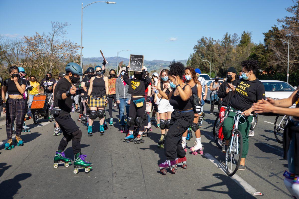 Bay Area roller skaters boogie to music at a stoplight as they head towards Japantown Sunday I Photo by Yami Sun