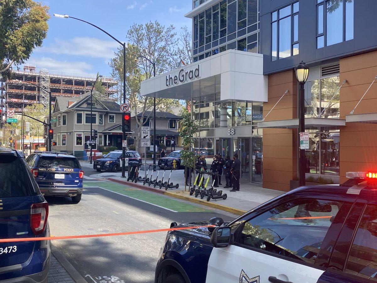 San Jose police officers close off the entrance to The Grad San Jose, located on San Carlos and East 3rd Street, after reports of a shooting on April 24. Photo by Jesus Tellitud