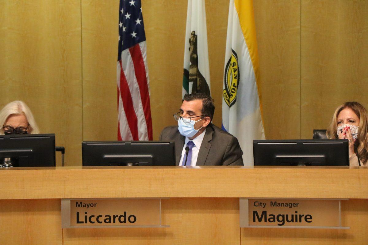 San Jose Mayor Sam Liccardo listens to a community member during the public forum section of Tuesday's city council meeting at city hall. Carolyn Brown | Spartan Daily