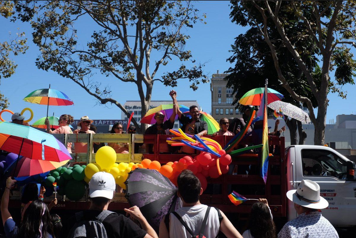 San Jose community members parade on top of a moving float in downtown during the Silicon Valley Pride Festival. Alexia Frederickson | Spartan Daily