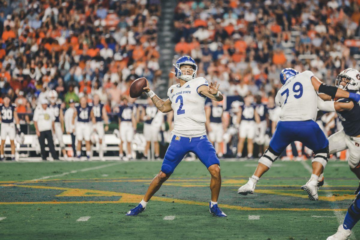 Junior quarterback Chevan Cordeiro drops back to pass against Auburn at Jordan-Hare Stadium on Saturday night. He threw for 275 yards and rushed for 23 yards.