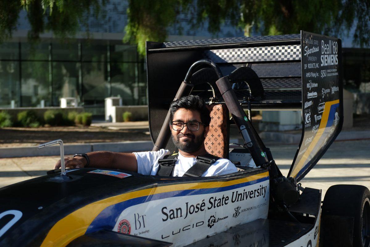 Ashwin Wiswesvaran poses in a car Monday for a picture.