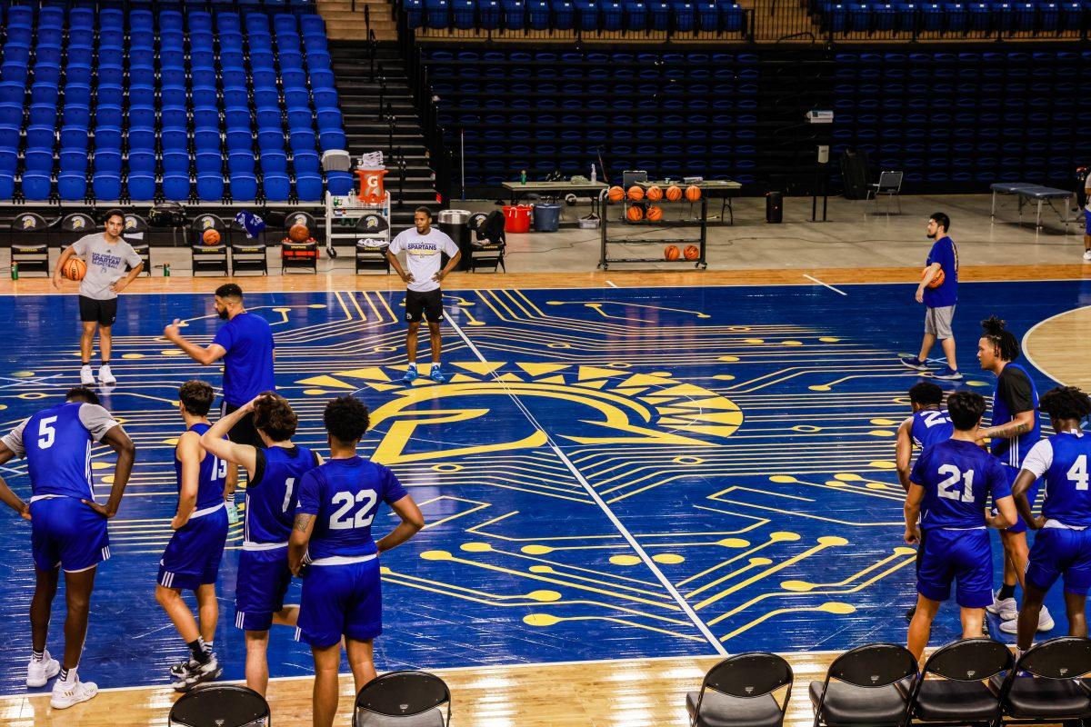 The San Jose State men's basketball team practices on the newly designed court for the upcoming season Thursday morning at the Provident Credit Union Center.