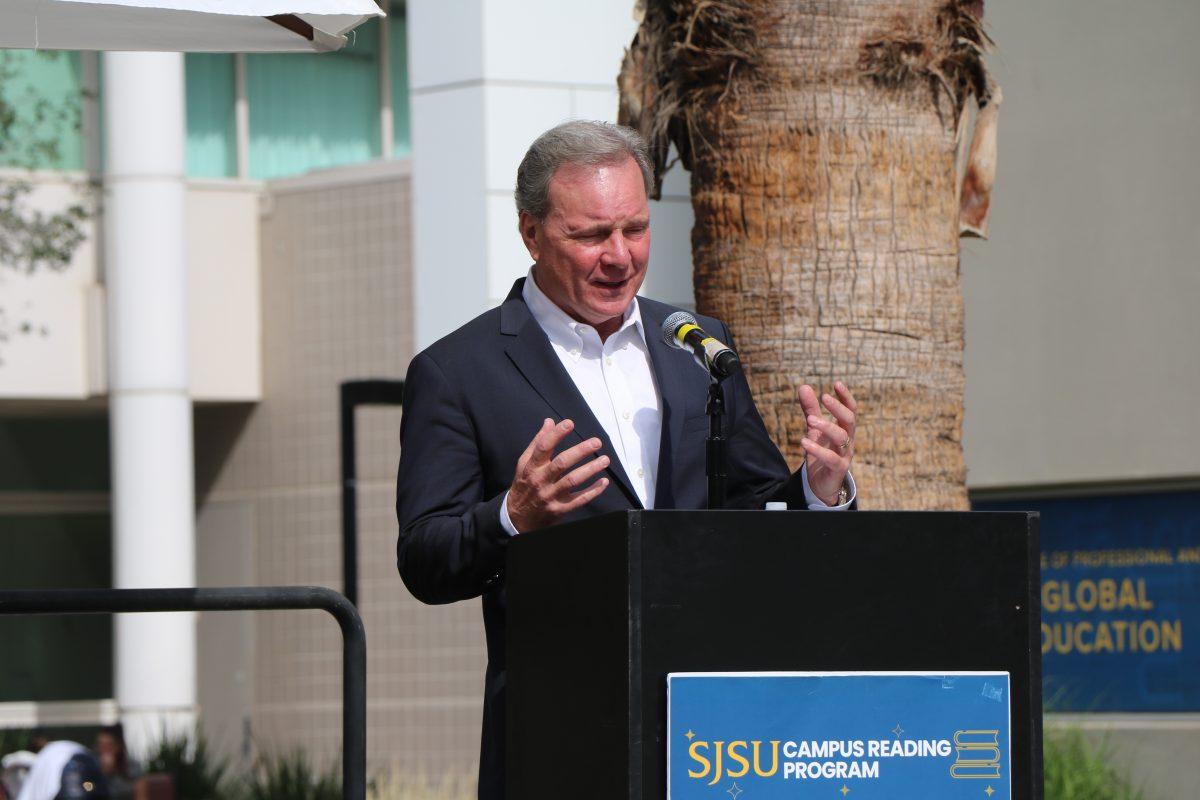 California State Senator Dave Cortese talks about the state's efforts to combat climate change issues at a podium in front of several San Jose State community members Tuesday on Seventh Street. Alessio Cavalca | Spartan Daily