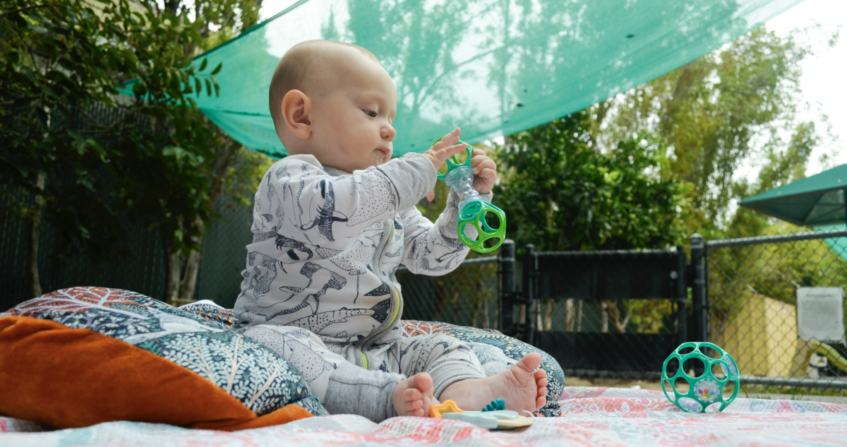 Seven-month-old Tilden DeVries plays with a toy after his nap time at the Child Development Center, which is located on South Eighth Street across from SJSU, on Oct. 5. Nathan Canilao | Spartan Daily