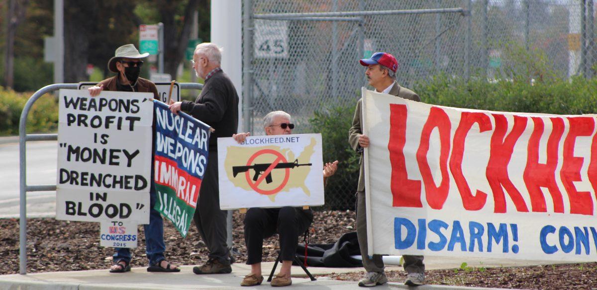 A few demonstrators make their presence known in front of the Lockheed Martin headquarters in Sunnyvale, about 11 miles northwest of San Jose State, on Friday. Rainier de Fort-Menares | Spartan Daily 