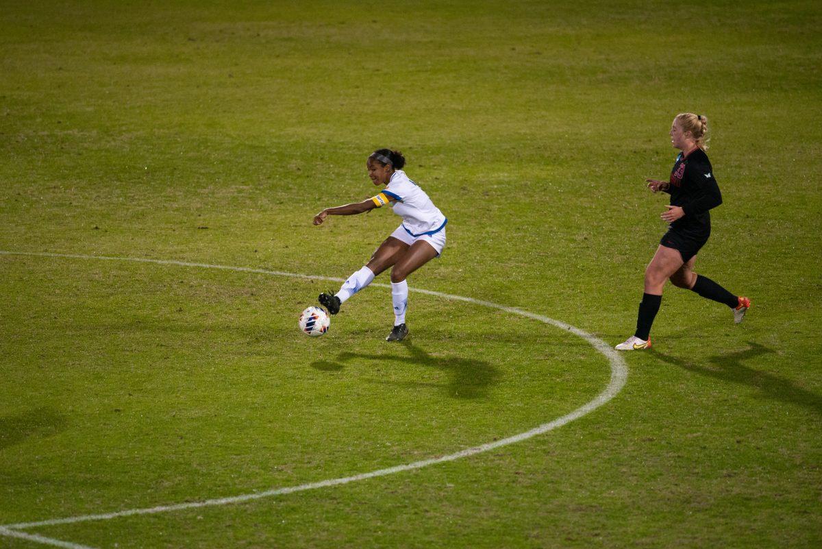 Senior defender Jada Wilson attempts a pass during SJSU&#8217;s NCAA game against Stanford at Maloney Field at Laird Q. Cagan Stadium Friday night. Travis Wynn | Spartan Daily