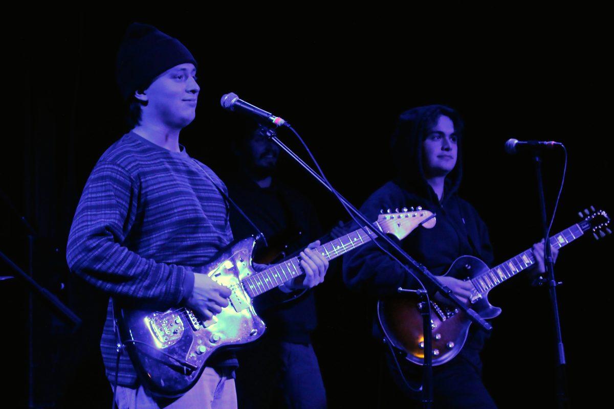 Singer-songwriter Landon Conrath (left) preforms with his bandmate Caleb Dee (right) as an opener for Windser at The Catalyst Club in Santa Cruz on Friday night. 