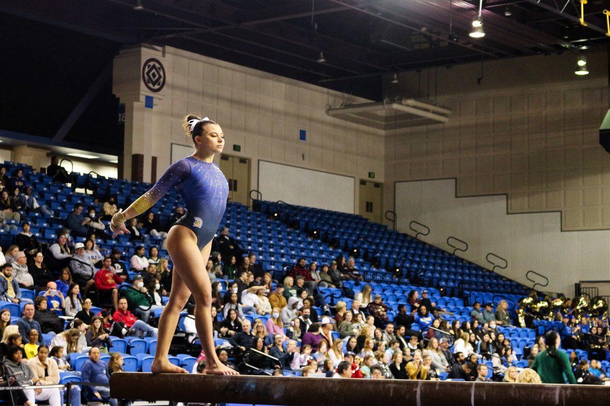SJSU all-around gymnast Lauren Macpherson prepares to start her routine on the beam during Saturday's meet at the Provident Credit Union Event Center.