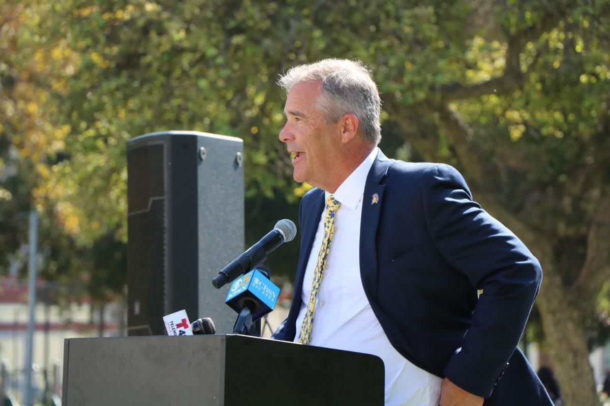 Then Interim President Steve Perez speaks in front of the Olympic Black Power Statue at San Jose State at the 54th anniversary of Tommie Smith and John Carlos&#8217;s 1968 Olympic protest on Oct. 13, 2022. Perez left SJSU on Jan. 16.