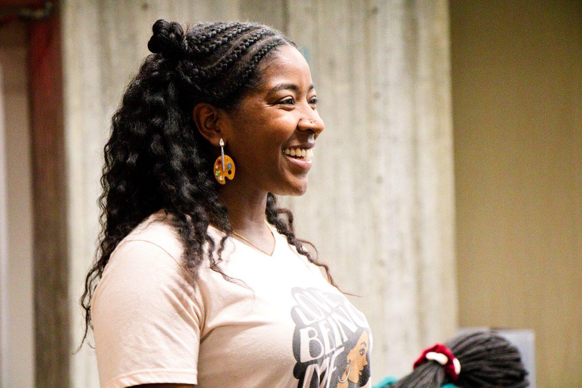 Illustrator and guest speaker Paige Mason discusses activism and art with attendees for the first Activism in Action series on Thursday in room 2 of the Student Union.