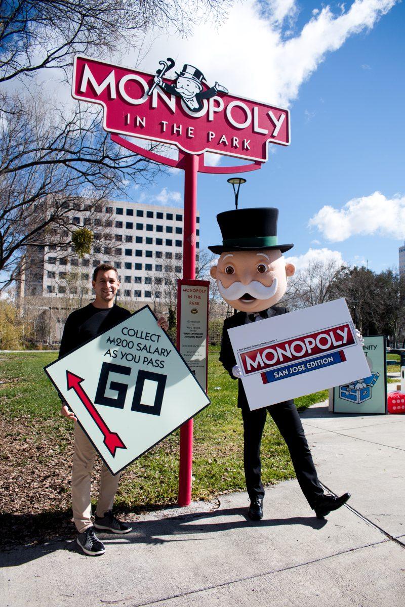 Top Trumps USA Representative Aaron Green announces there will be a San Jose-based Monopoly board game at Monopoly In the Park Wednesday morning. 