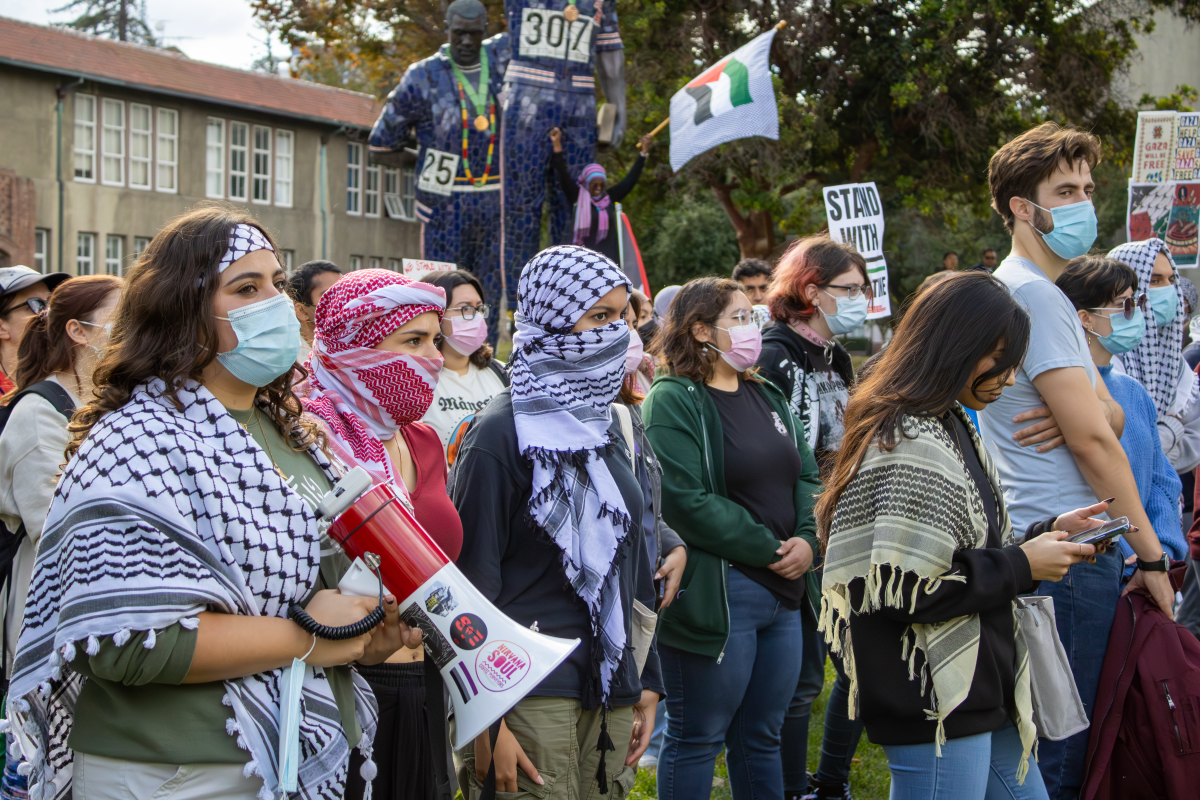 Students march against an arrest