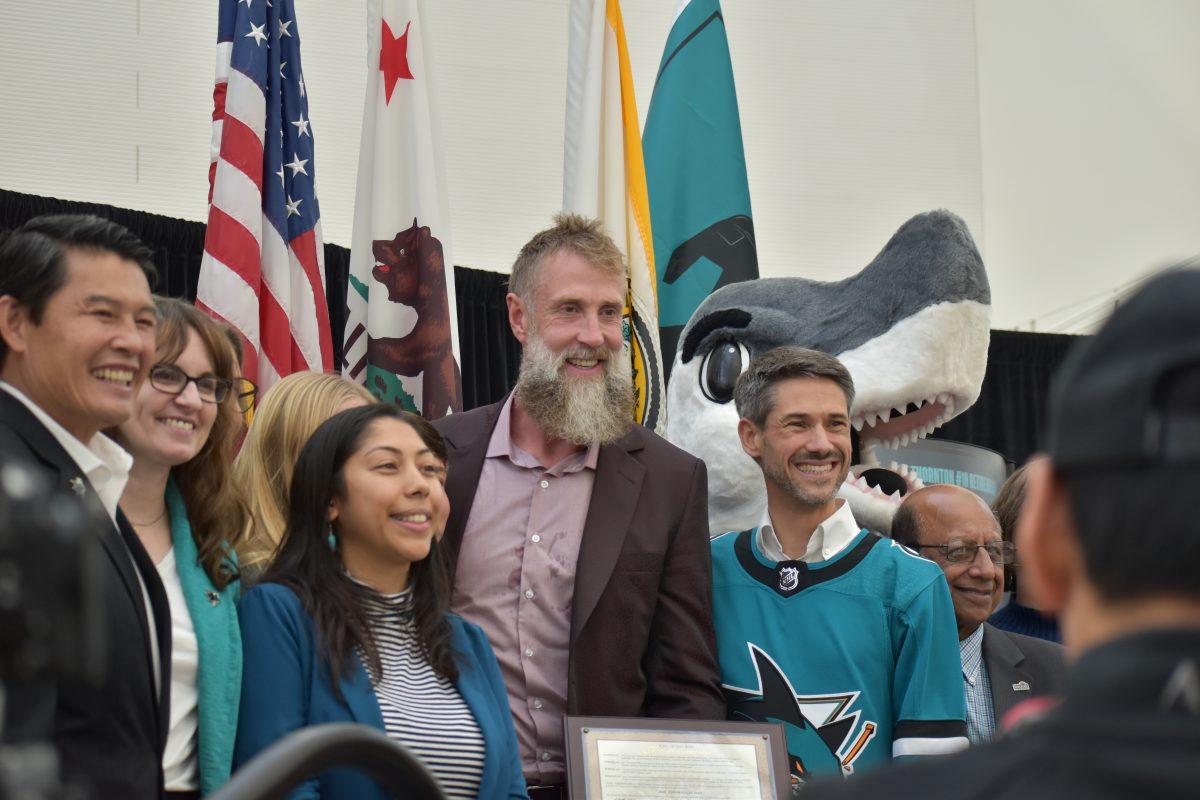 Joe Thorton (middle) stands adjacent to Mayor Matt Mahan (right) in celebration of Thorton.