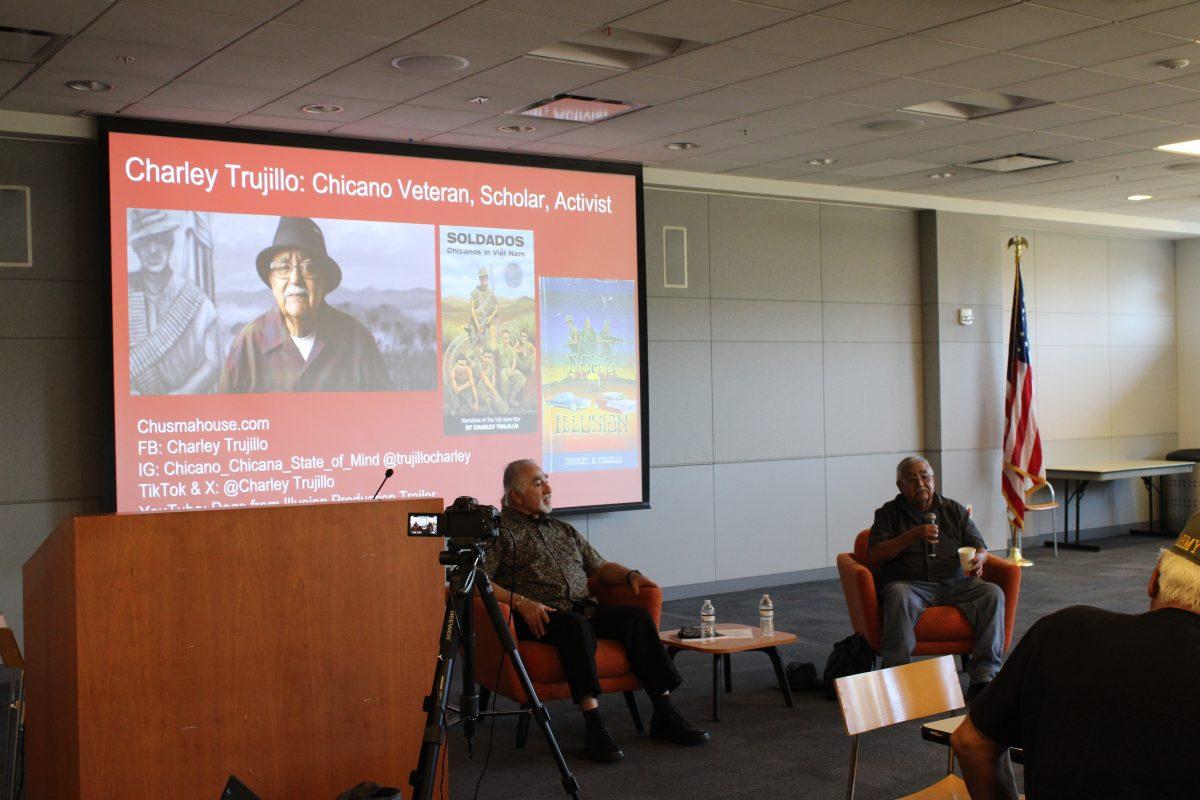 Richard T. Garc&#237;a (left) and Charley Trujillo (right) talk about their time during the Vietnam War at the Dr. Martin Luther King, Jr. Library. 