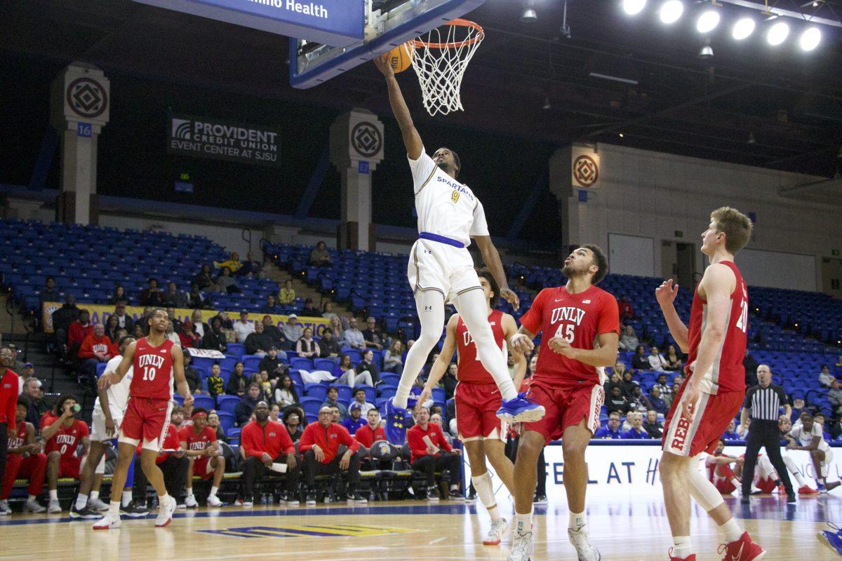 SJSU guard Josh Uduje (9) scores against UNLV Tuesday evening at the Provident Credit Union Event Center.