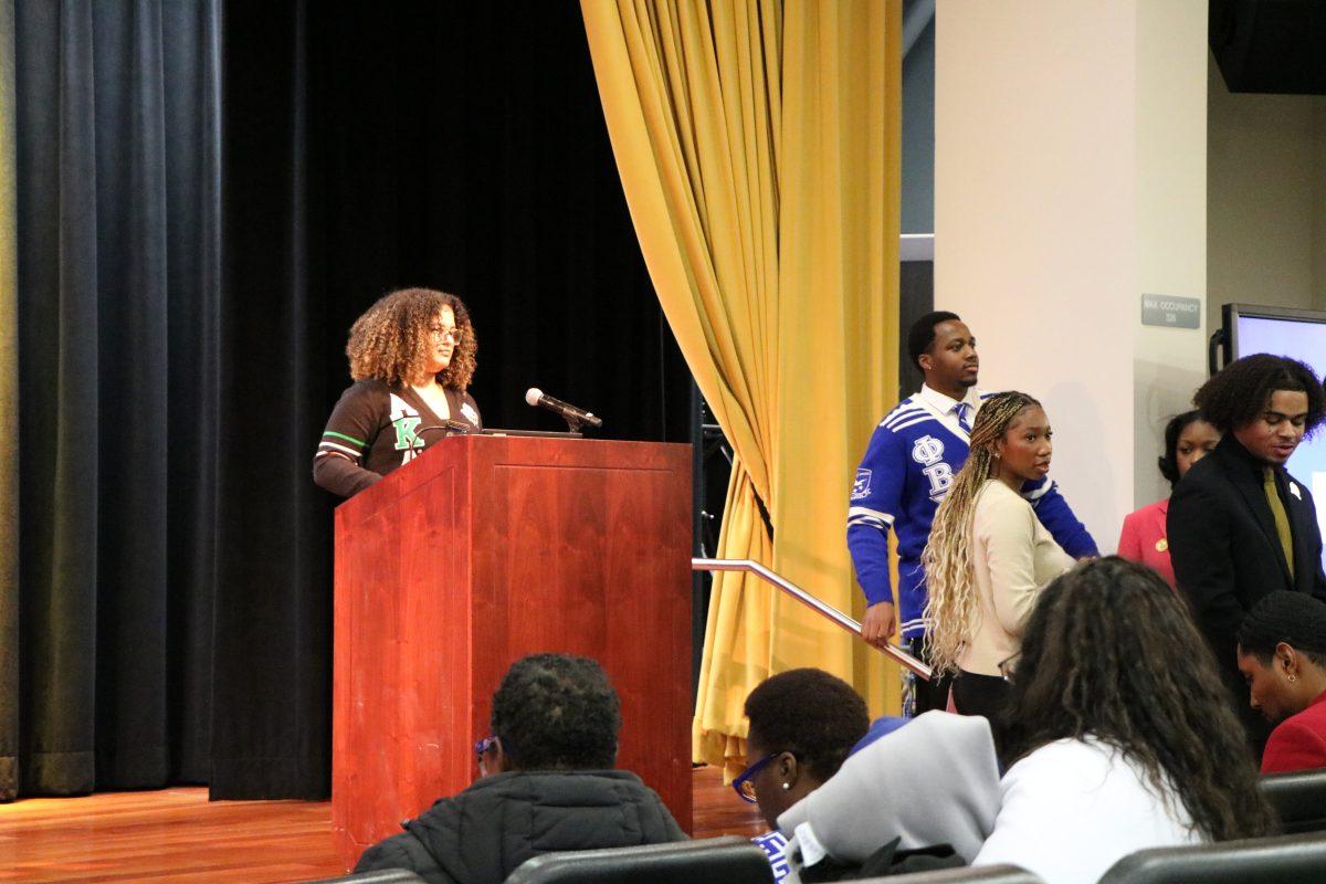 An SJSU student speaks at the National Pan-Hellenic Council, a body of historically African American Greek letter organizations, informational event yesterday on campus.