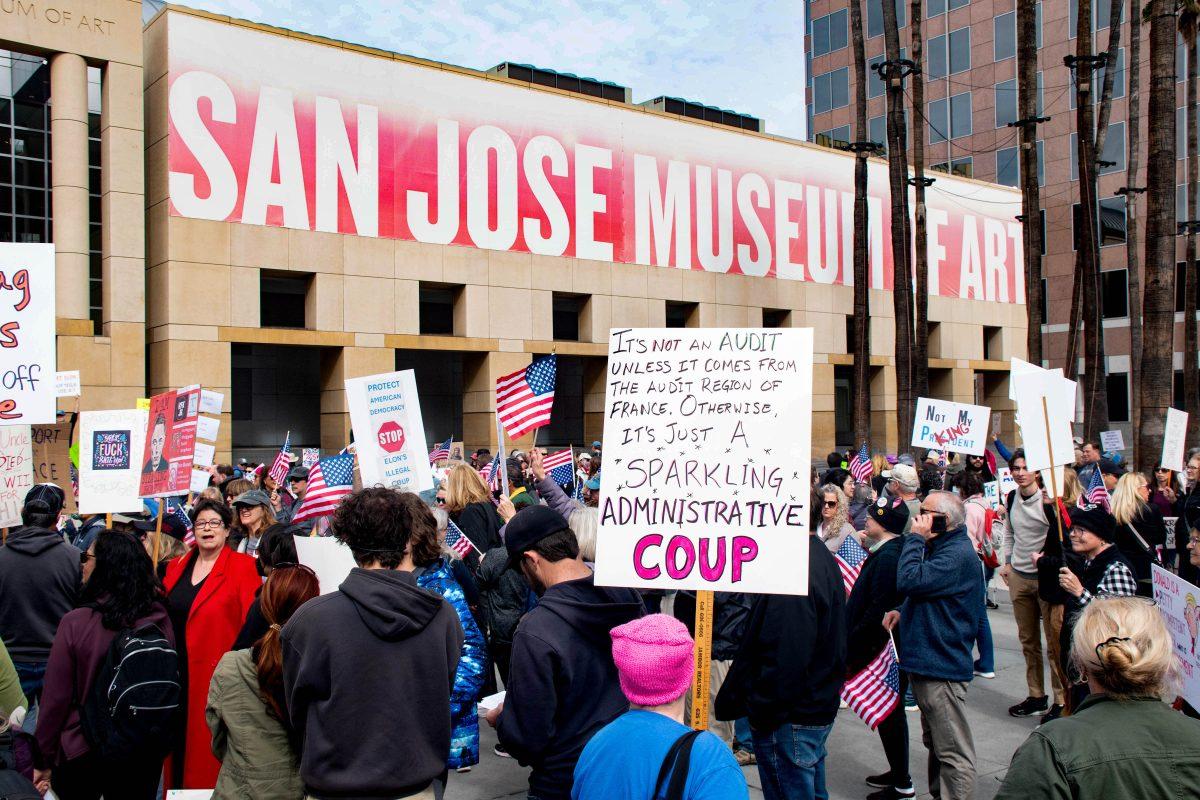 Protesters gather in Downtown San Jos&#233; on Presidents&#8217; Day holding signs opposing the Trump administration on Monday afternoon near San Jos&#233; State&#8217;s campus.