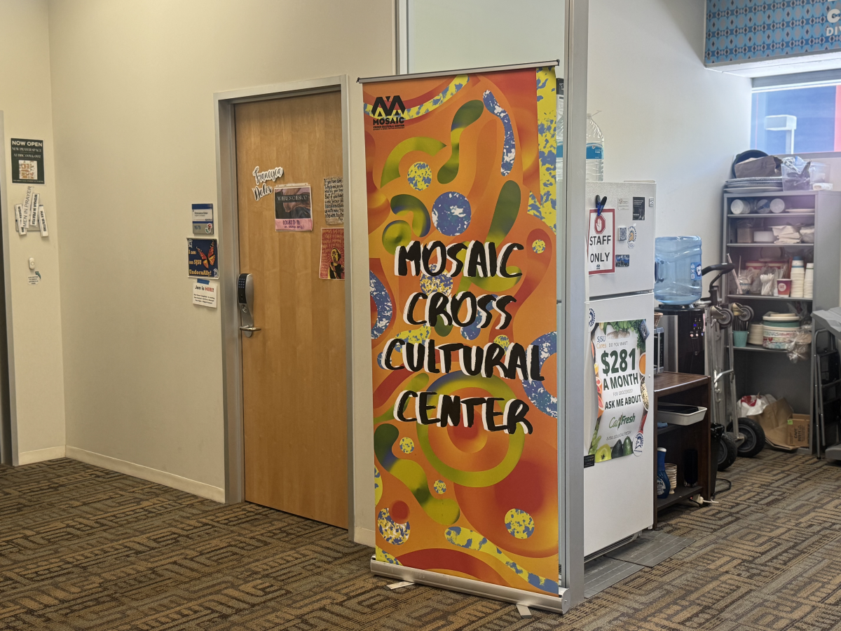 A Mosaic Cross Cultural Center stands welcoming students to enter the center.