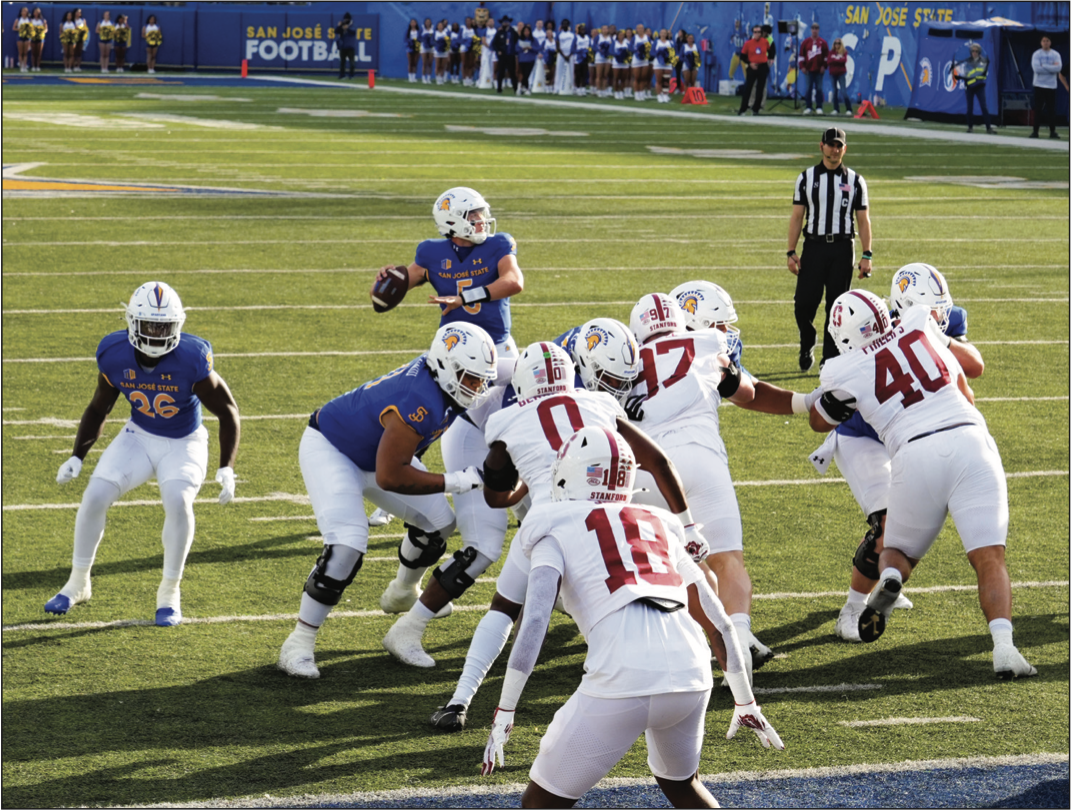 SJSU quarterback Walker Eget (5) set to throw against Stanford’s defense on Nov. 29, 2024 leading the team to a 34-31 victory at CEFCU stadium in San José,Calif. Eget is expected to be the starting quarterback for the Spartans this season.
