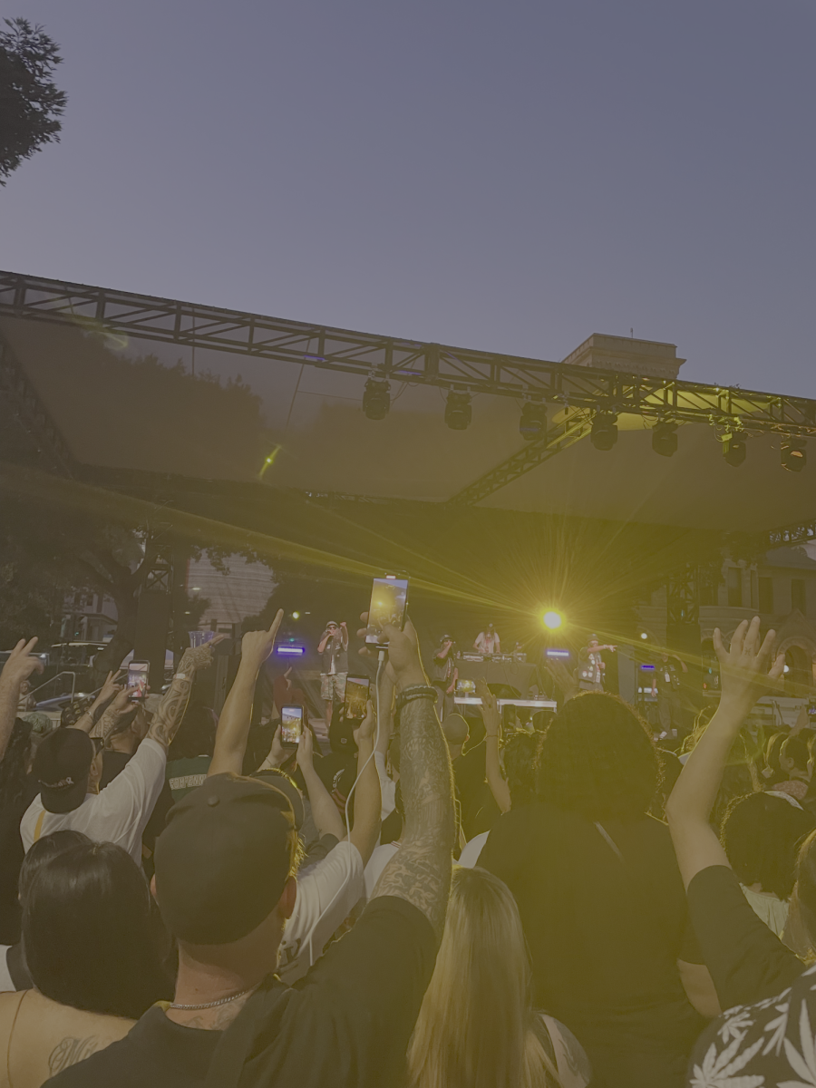 Audience rocks out as Oakland hip-hop group, Souls of Mischief, performs in Plaza de César Chávez at the 35th annual Music in the Park on Sunday evening.
