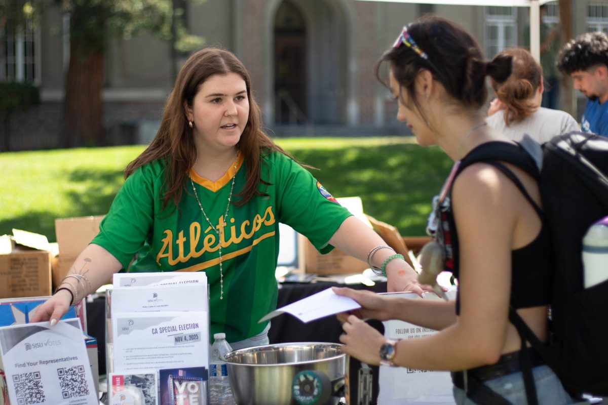 Students and community members interact on Tuesday afternoon on the Smith and Carlos lawn on campus.