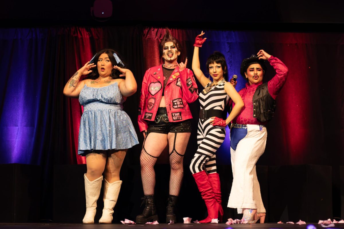 Left to right: Kitty KaPowww, Fenderqueer, Lisa Frankenstein and Jota Mercury pose on stage after a group performance at Drag Brunch After Dark.