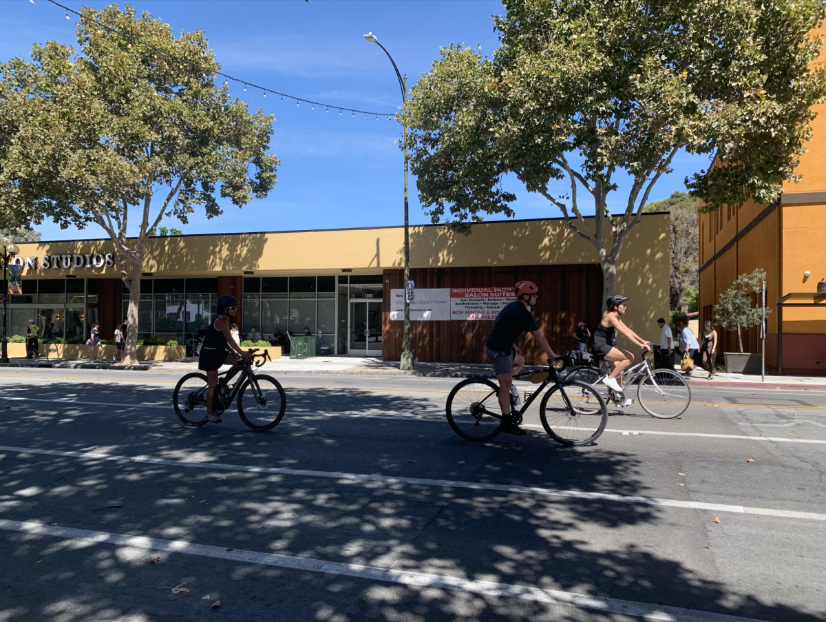 Bikers and community members enjoy the blocked off streets on Lincoln Ave. at the “Viva Calle SJ” event on Sunday.