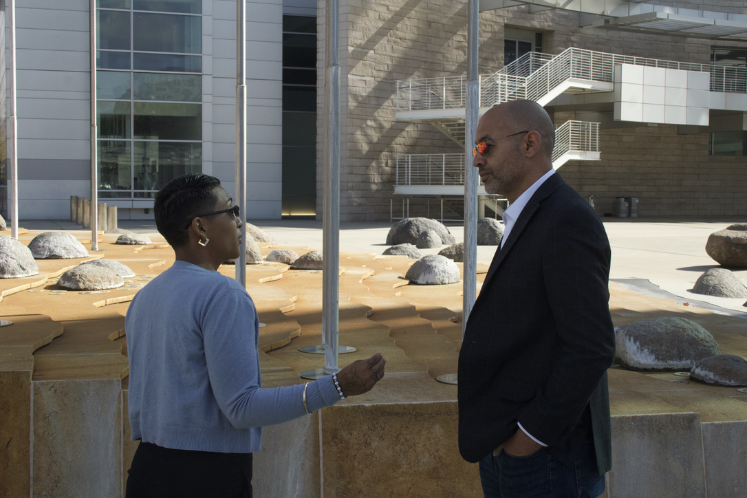 Yari Castillo, left, speaks with District 10 councilmember George Casey on her experiences as an RV owner outside San José City Hall on Tuesday afternoon.
