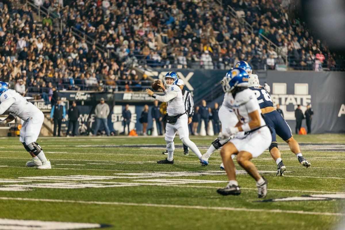 SJSU quarterback Walker Eget stands in the pocket searching for an open receiver.