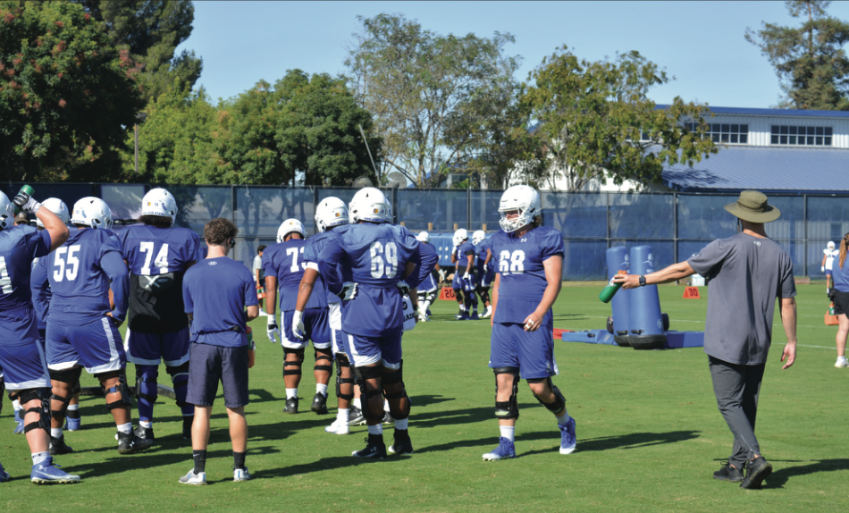 SJSU football players run drills at practice preparing for its fi rst confrence game of the season. The Spartans are 1-3.
