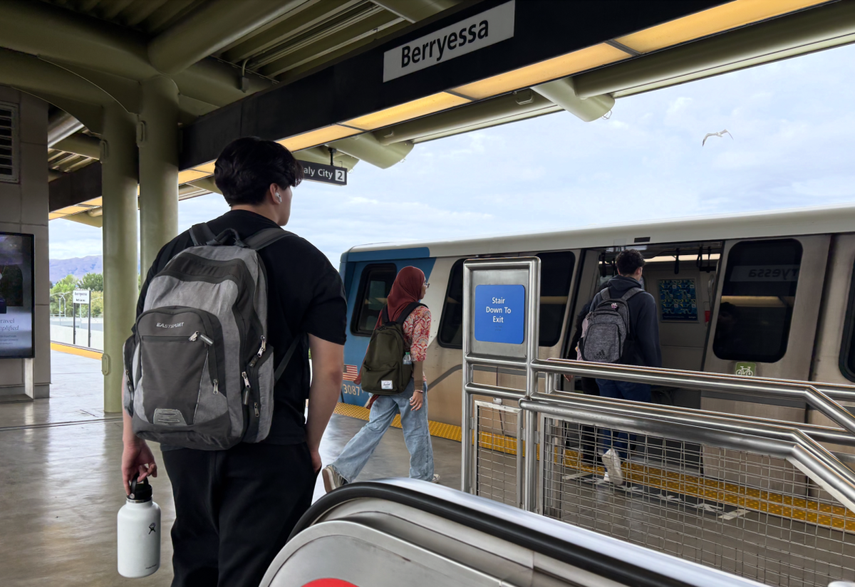 San José State University students board Bay Area Rapid Transit (BART) at the Berryessa Station near the SAP Center.
